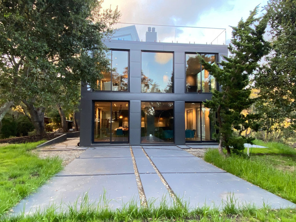 Paolo-Volpis-Architect-Oakland-California-modern-black-metal-homes-residential-steel-contact-gl-and-houses-metal-floor-plans-geometric-concrete-home-stone-water-elements-driveway-ideas-with (1).jpg